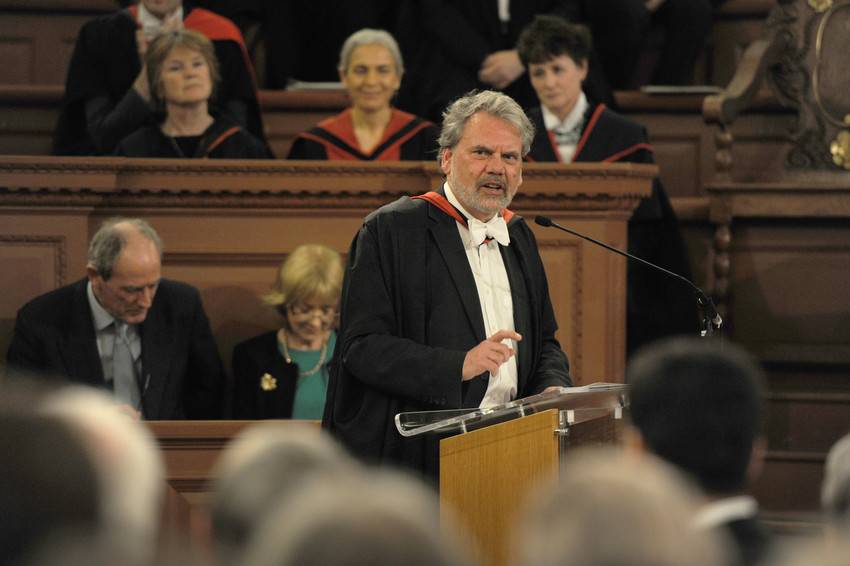 Professor Angus Hawkins calls a cohort of award recipients to the podium